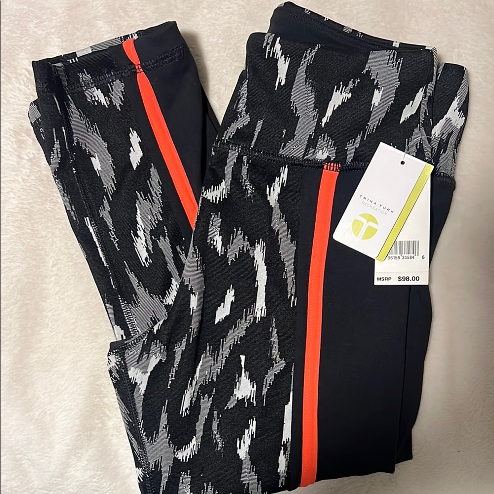 Trina Turk Dynamic Black and Gray Leggings with Vibrant Orange
